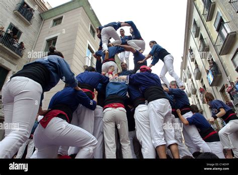 Participants in human tower festival in Catalonia, Spain Stock Photo - Alamy