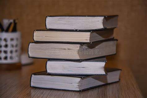 Stack of Old Books on the Table Side View Stock Photo - Image of used ...