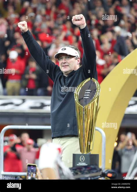 Georgia Bulldogs head coach Kirby Smart celebrates during the trophy ...