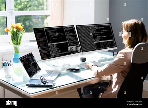 Programmer Woman Coding On Computer. Coder Girl Stock Photo - Alamy