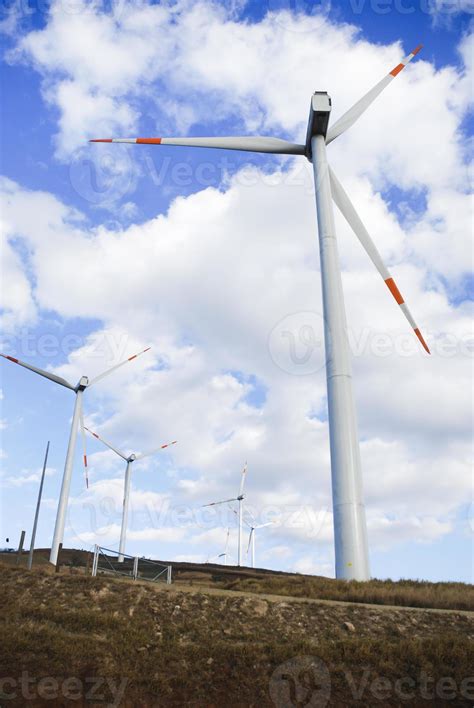 Wind turbines with a background of white clouds 1238812 Stock Photo at Vecteezy