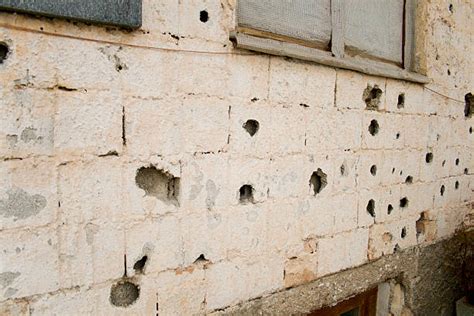 Best Bullet Hole Wall Stock Photos, Pictures & Royalty-Free Images - iStock