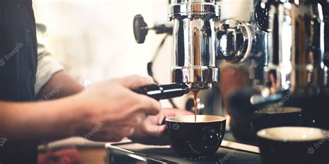 Premium Photo | Barista making coffee