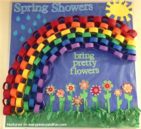 a poster with flowers and a rainbow on it