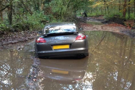 Footballer Gets Porsche Panamera Stuck in Muddy Woods By Blindly Following Navigation ...