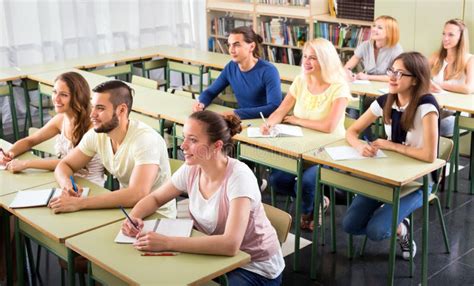 Group of College Students in Classroom Stock Photo - Image of attentive ...