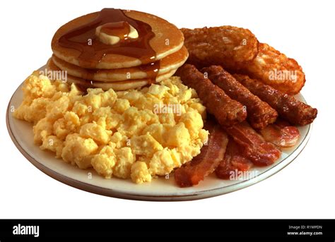 super breakfast with scrambled eggs, bacon, sausage, hashed browns and ...