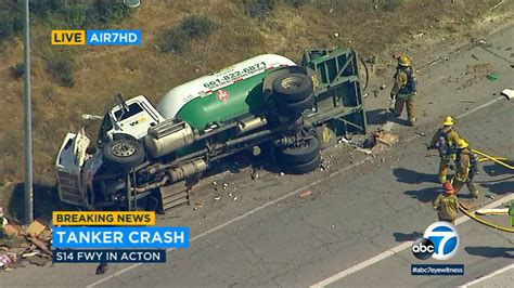 14 Freeway accident: 5 injured, including mother and child, in crash involving overturned tanker ...