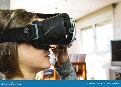 Young Woman at Home with VR Glasses. Virtual Reality Goggles Concept Stock Photo - Image of ...