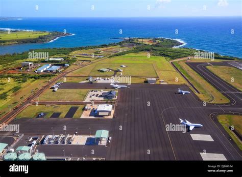 Aerial view of the runway and plane hangars of Lihue airport on Kauai ...