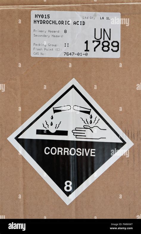 A standard corrosive hazchem warning label on the packaging of a ...