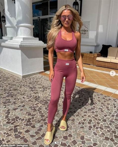 Love Island's Molly Smith shows off recent boob job and toned abs as she poses ...