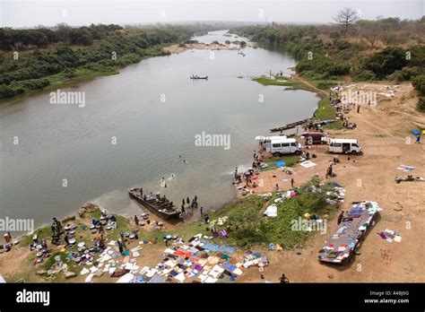 Washday beside the Black Volta river northern Ghana Stock Photo - Alamy