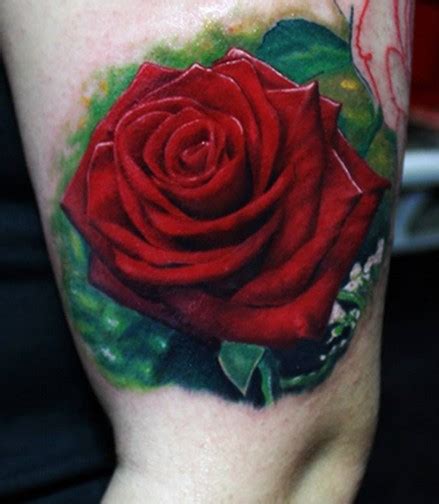 Stunning very realistic colored big rose tattoo on leg - Tattooimages.biz