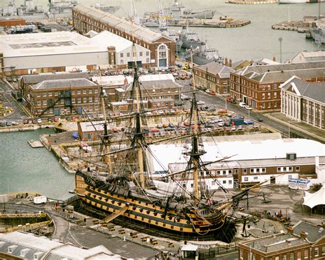 The HMS Victory in permanent dry dock, the hull wood has dried out and ...