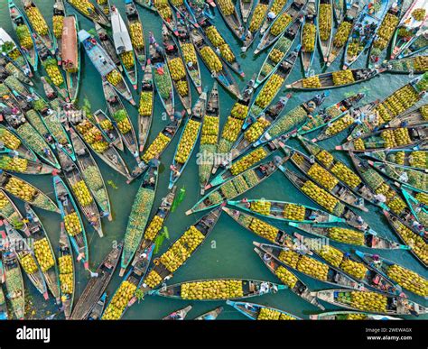 Aerial view of floating market of seasonal fruits on the boats in ...