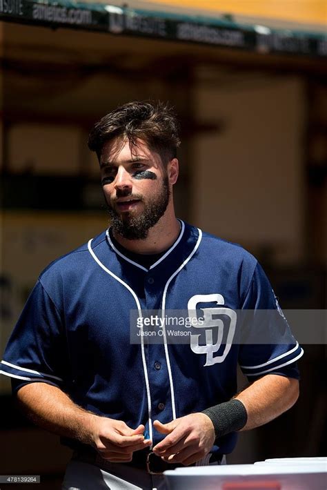 Austin Hedges of the San Diego Padres stands in the dugout before the ...