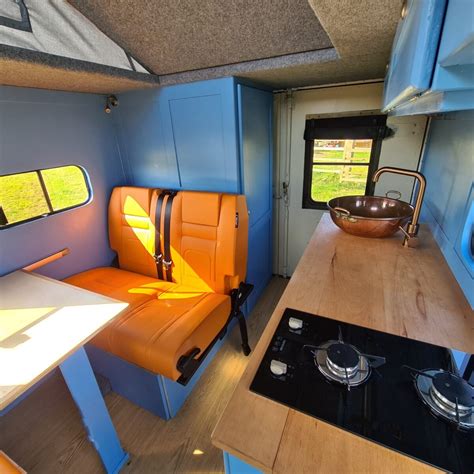 Tradesman upcycles military ambulance used in Iraq War into a campervan