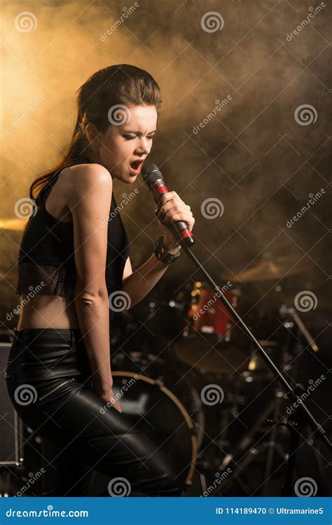 Portrait of Young Woman Singing Stock Photo - Image of lighting, performance: 114189470