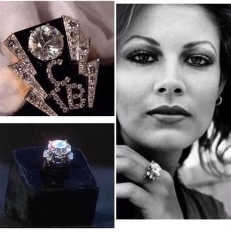 an image of a woman with rings on her finger and diamond ring in front of her face