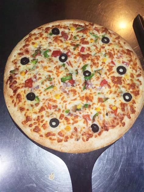 A slice pizza fast food Hyderabad Sindh