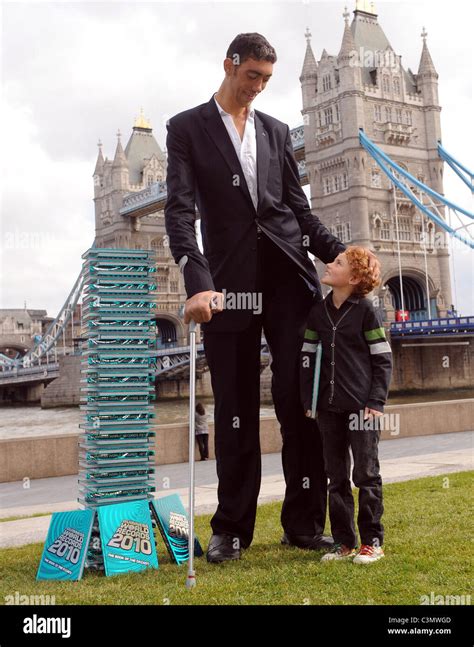 Sultan Kosen, the worlds tallest man, attends a photocall to launch the ...