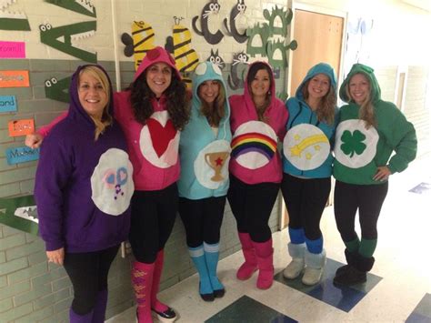 group of women in costumes posing for the camera