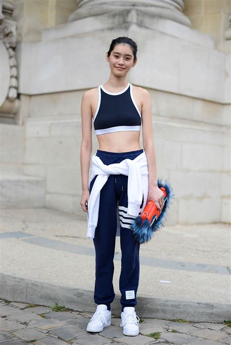 Street Style Stars Wearing Sports Bras To Fashion Shows In Paris | Glamour