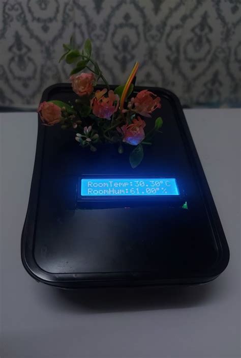 Smart Pot: A Comprehensive Monitoring System for Soil and Room Temperature and Humidity