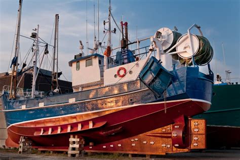 Fish trawler on land stock photo. Image of clouds, sunlight - 28265806