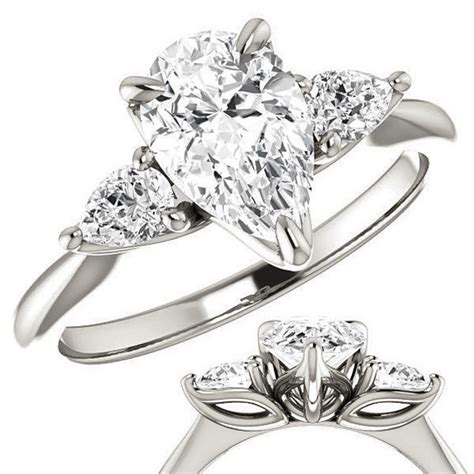 Pear Three Stone Moissanite Engagement Ring - enr336-pear - MoissaniteCo.com