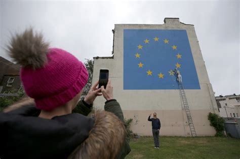 British Street Artist Banksy Creates Brexit Mural