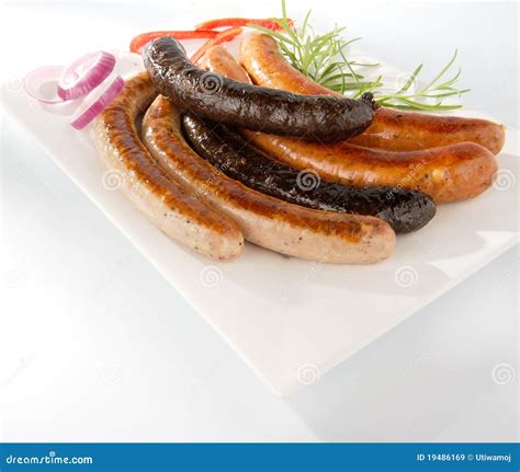 White Baked Sausage and Grilled Black Pudding Stock Image - Image of center, lard: 19486169