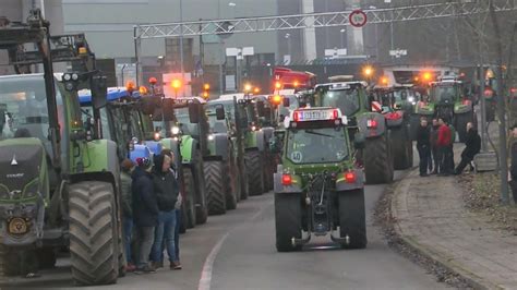 German farmers protest against government plan to cut tax breaks for diesel | World News | Sky News