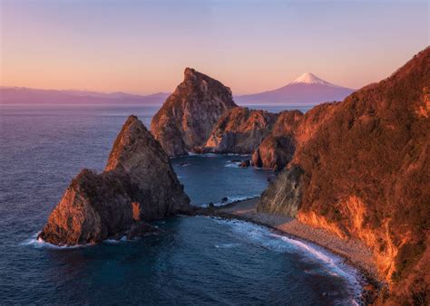 Volcanic Rock Formations and Mt Fuji from Izu, Japan [2048 x 1463][OC]