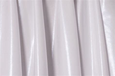 Items similar to White Pearl Mystique Iridescent Spandex Fabric on Etsy