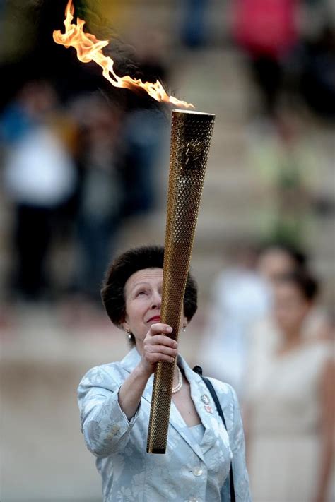 Greece passes Olympic torch to UK