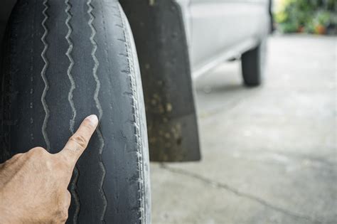 The Dangers of Bald Tires: Causes, Signs, and Effects - In The Garage ...