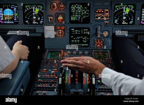 INSTRUMENT PANEL, COCKPIT OF AN AIRBUS A320 ON A PARIS-LISBON FLIGHT ...