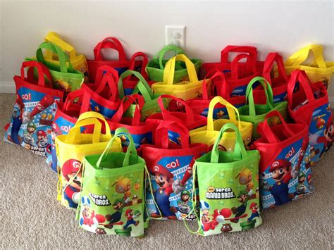 Super Mario brothers party goodie bags in bright fun colors | Tortas de mario bros, Decoracion ...