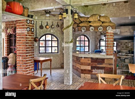 Rustic restaurant interior Stock Photo - Alamy