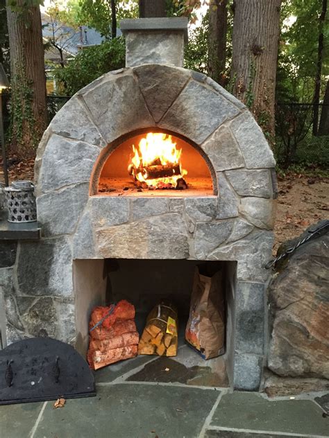 A wood-burning pizza oven is an amazing addition to any backyard space ...