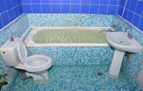 How to Clean Up a Flooded Bathroom [Step-by-Step Guide] - Loo Academy