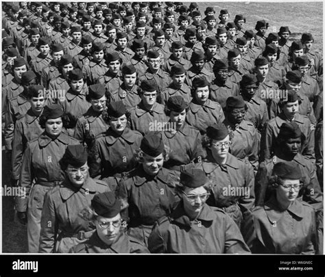 Fort McClellan, AL. Basic trainees march in company formation at the WAC training Center Stock ...