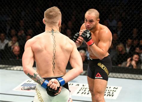 Conor McGregor taunting Eddie Alvarez before claiming the UFC ...