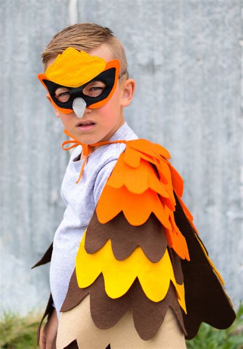 Bright and bold bird costume inspired by the oriole for boys and girls. A great dress up toy for ...