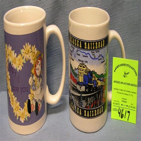 Lot - PAIR OF VINTAGE SOUVENIR MUGS