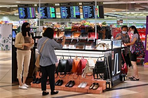 Changi Airport shops busier as travellers return; retail sales hit $1.1b in 2022 | The Straits Times