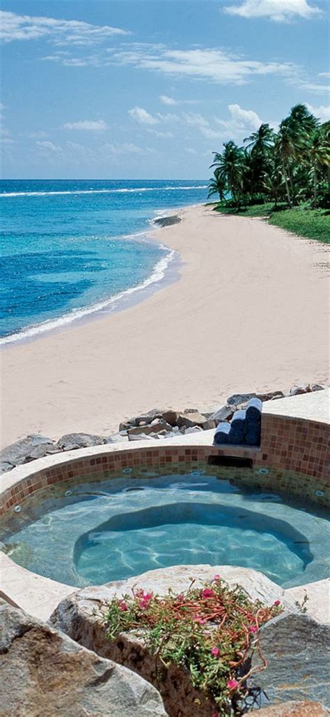 Private pool overlooking the beach at the Peter Island Resort and Spa in the British Virgin ...