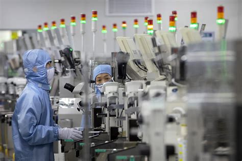 China cuts taxes to spur semiconductor development | AP News